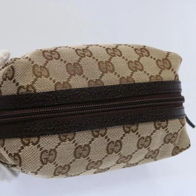 Shop Gucci Beige Canvas Clutch Bag ()