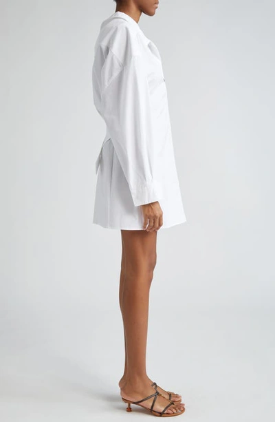 Shop Jacquemus La Mini Robe Chemise Long Sleeve Cotton Shirtdress In White