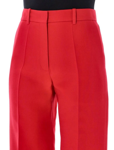Shop Valentino Garavani Crepe Couture Trousers In Red