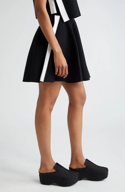Shop Jw Anderson Contrast Stripe Sweater Miniskirt In Black
