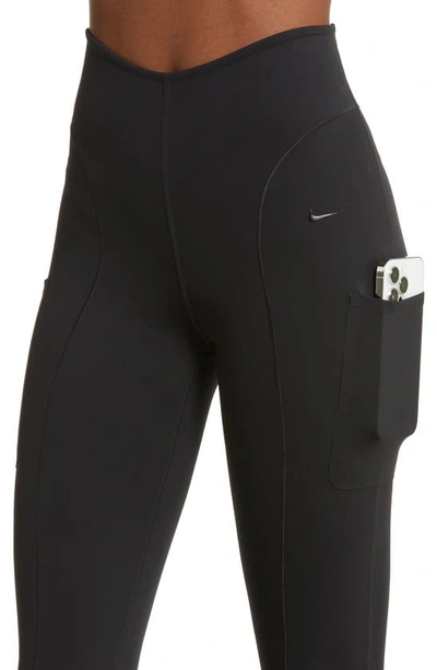 Shop Nike Dri-fit Flare Leggings In Black