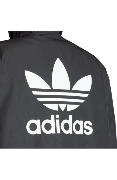 Shop Adidas Originals Oversize Adicolor Trefoil Hooded Windbreaker In Black/ White
