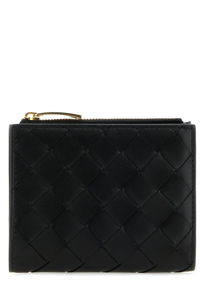 Shop Bottega Veneta Wallets In Black-gold