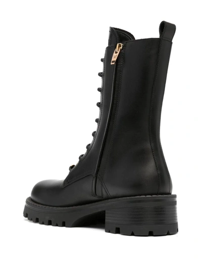 Shop Versace Boots In Black