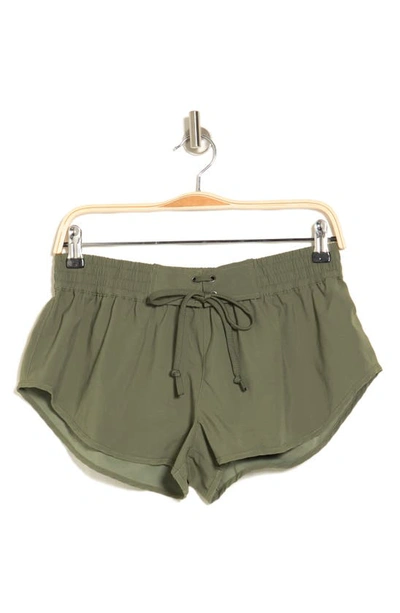 Shop Free People Movement Easy Does It Shorts In Moss