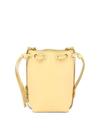 Shop Chloé Marcie Micro Bucket Bag In Yellow