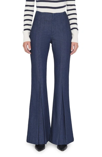 Shop Frame Pleated Flare Denim Pants In Rinse