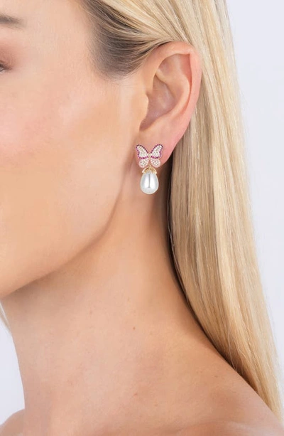 Shop Eye Candy Los Angeles Jaci Cz Butterfly & Imitation Pearl Drop Earrings In Gold