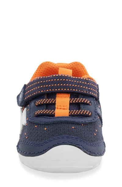 Shop Stride Rite Soft Motion Zips Runner Sneaker In Navy/ Orange