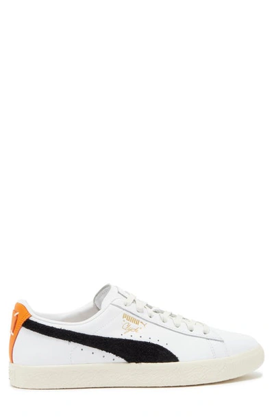 Shop Puma Clyde Sneaker In  White- Black-orange
