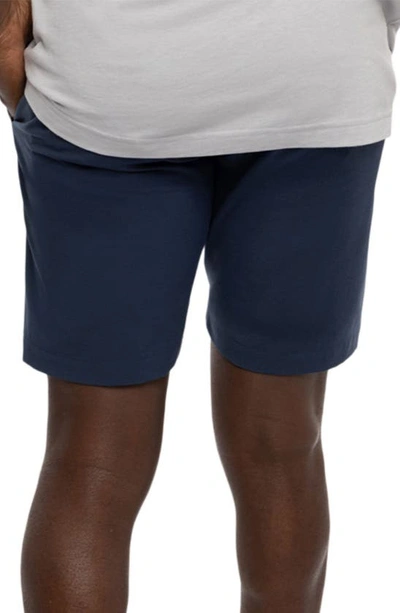 Shop Travis Mathew Travismathew Open To Close Tech Chino Shorts In Dress Blues