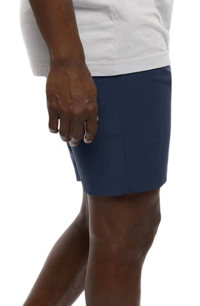 Shop Travis Mathew Travismathew Open To Close Tech Chino Shorts In Dress Blues