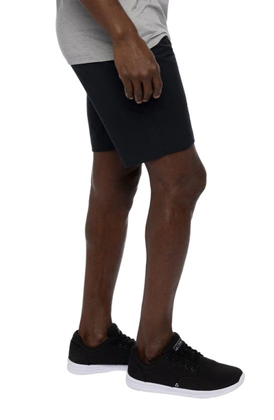 Shop Travis Mathew Open To Close Tech Chino Shorts In Black