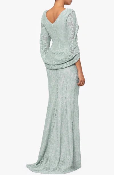 Shop Betsy & Adam Drape Back Cape Sleeve Lace Trumpet Gown In Sage