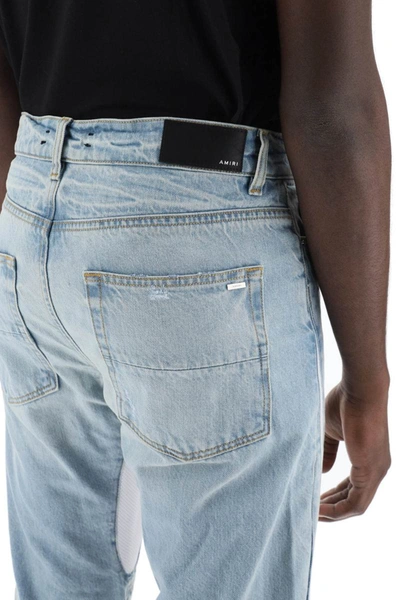 Shop Amiri Mx-3 Jeans With Mesh Inserts In Blue