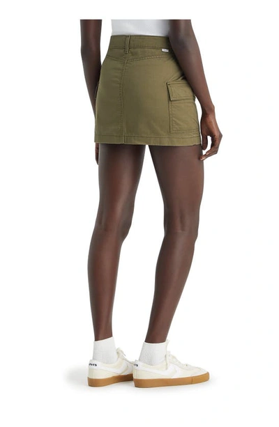 Shop Levi's® Cargo Miniskirt In Olive Night