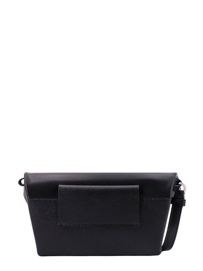 Shop Maison Margiela Leather Clutch With Metal Logoed Plaque In Black