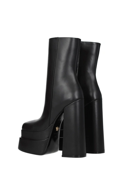 Shop Versace Ankle Boots Aevitas Leather Black