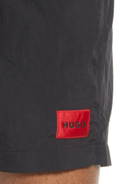 Shop Hugo Boss Dominica Swim Trunks In Black