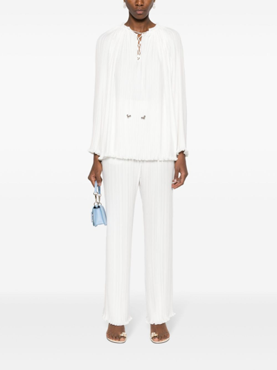 Shop Lanvin Pleated Trousers In White