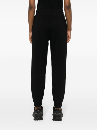 Shop Moncler Logo Cotton Sweatpants In Black
