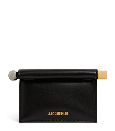 Shop Jacquemus Mini Leather Pochette Cross-body Bag In Black