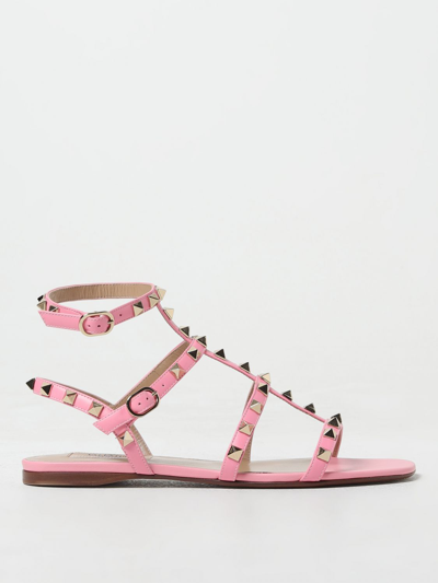 Shop Valentino Rockstud Sandals In Nappa With All-over Studs In 粉色