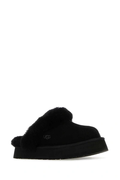 Shop Ugg Slippers In Black