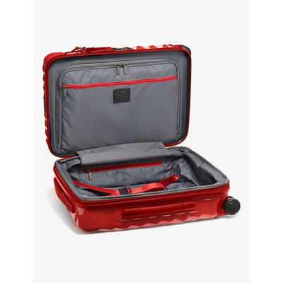 Shop Tumi International Expandable 4-wheeled Polycarbonate Carry-on Suitcase In Red