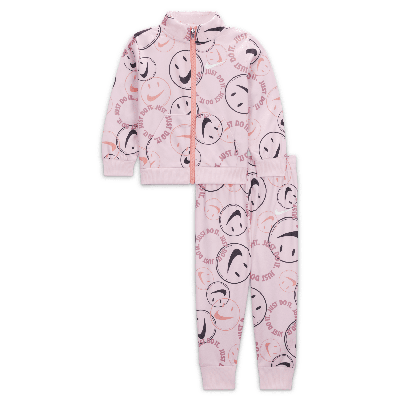 Shop Nike Smiley Swoosh Printed Tricot Set Baby Tracksuit In Pink