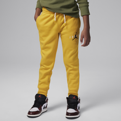 Shop Jordan Little Kids' Sustainable Fleece Pants In Yellow