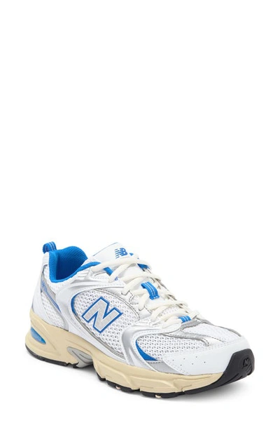 Shop New Balance Gender Inclusive 530 Sneaker In White/ Blue Oasis