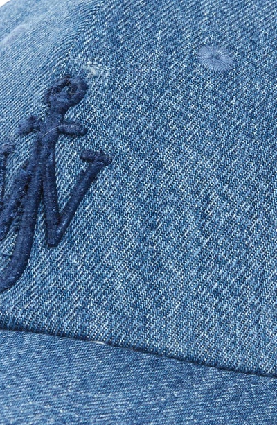 Shop Jw Anderson Embroidered Logo Adjustable Denim Baseball Cap In Blue