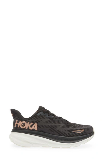 Shop Hoka Clifton 9 Running Shoe In Black/ Rose Gold