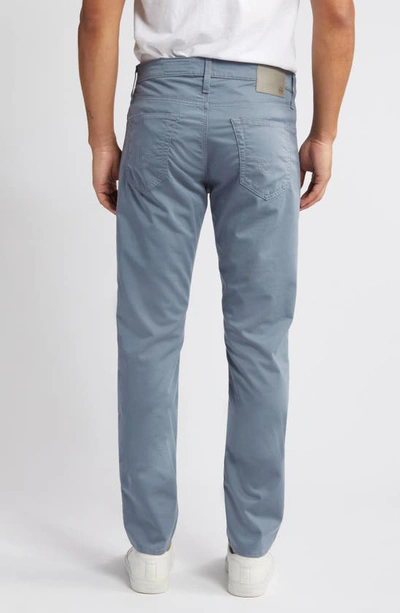 Shop Ag Tellis Airluxe™ Commuter Performance Sateen Pants In Blue Ice