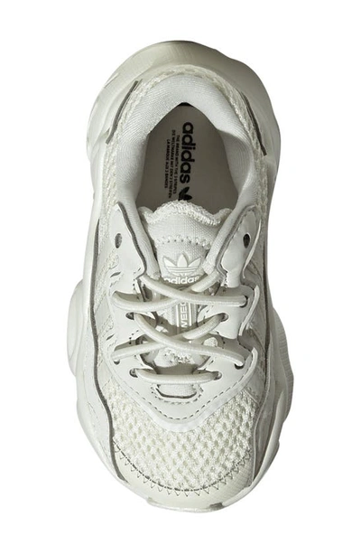 Shop Adidas Originals Kids' Ozweego Sneaker In Ivory/ Ivory/ Ivory