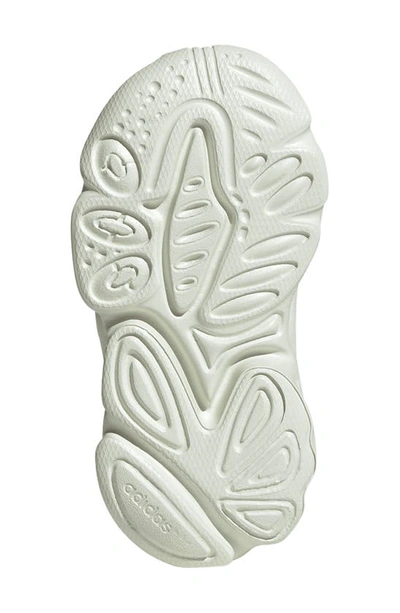 Shop Adidas Originals Kids' Ozweego Sneaker In Ivory/ Ivory/ Ivory