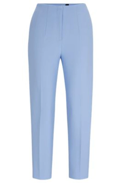 Shop Hugo Boss Relaxed-fit Trousers With A Tapered Leg In Blue
