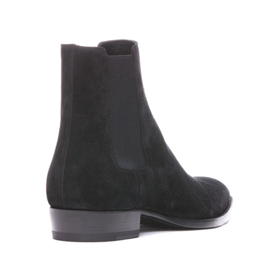 Shop Saint Laurent Boots In Black