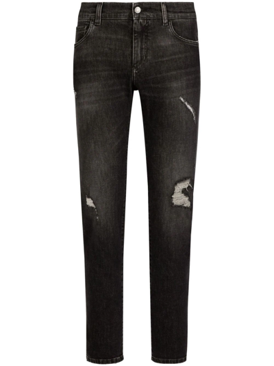 Shop Dolce & Gabbana Jeans Slim Fit In Denim Stretch Con Abrasions In Black