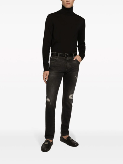 Shop Dolce & Gabbana Jeans Slim Fit In Denim Stretch Con Abrasions In Black