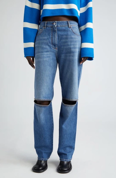 Shop Jw Anderson Knee Cutout Jeans In Light Blue