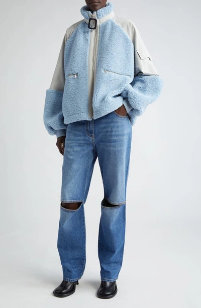 Shop Jw Anderson Knee Cutout Jeans In Light Blue