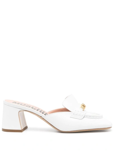 Shop Moschino Sandals In White