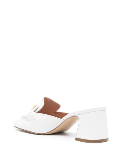 Shop Moschino Sandals In White