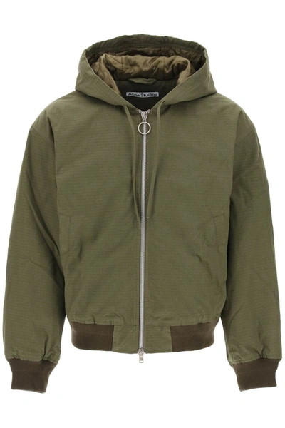Shop Acne Studios Hooded Bomber Jacket In Green