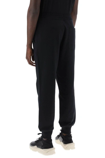 Shop Y-3 French Terry Cuffed Jogger Pants In Black