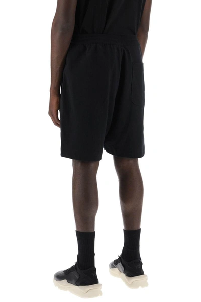 Shop Y-3 French Terry Jogger Bermuda Shorts In Black