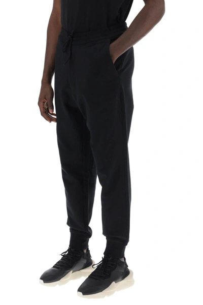 Shop Y-3 French Terry Cuffed Jogger Pants In Black