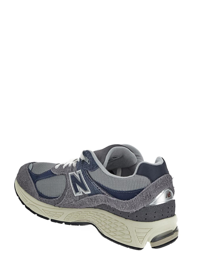 Shop New Balance 2002r Sneakers In Grey